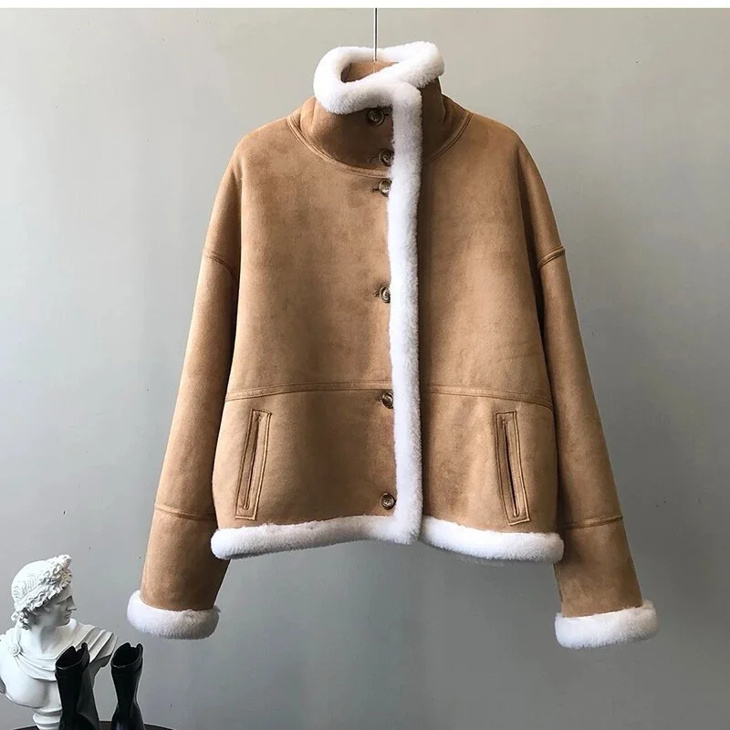 Today’s Deal Winter luxury: faux leather shearling coat lined with real sheepskin. Double sided. for maximum warmth and style. Handmade